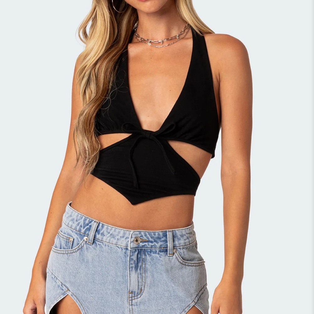 Black going out top